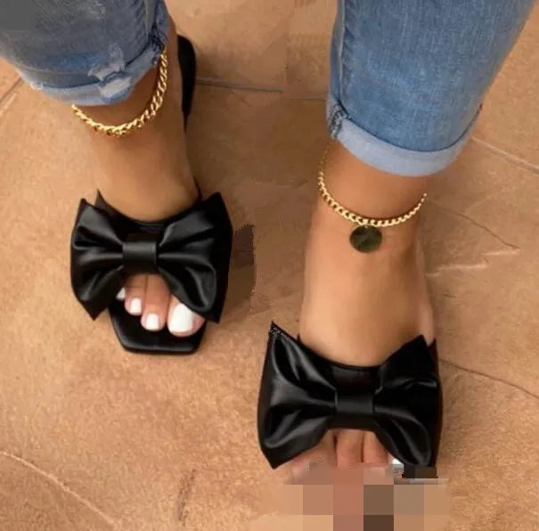 Spring/summer new flat leather bow non-slip casual all-match fashion women sandals.