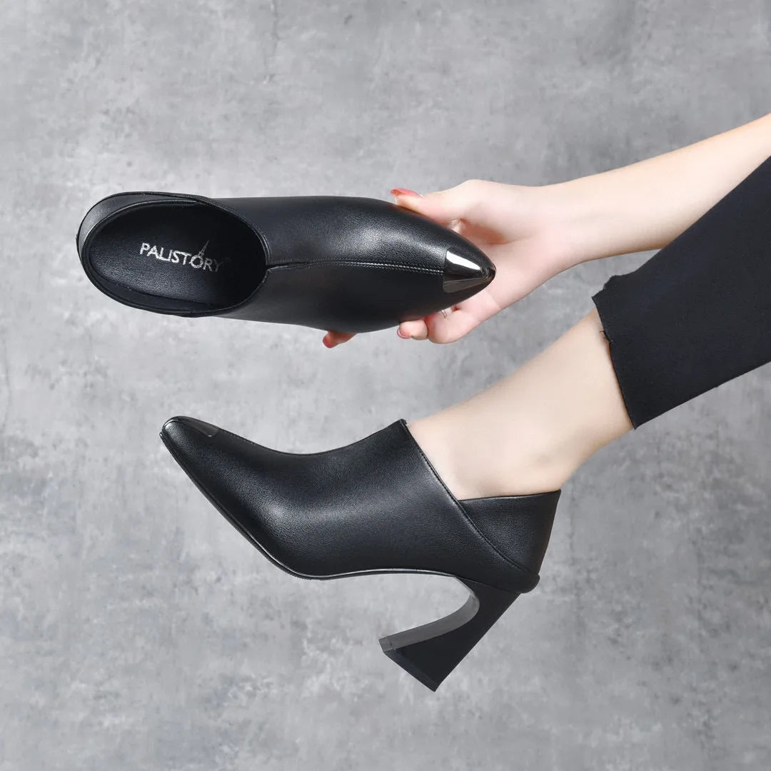 Women's pointed New European style cowhide pointed horseshoe heel .