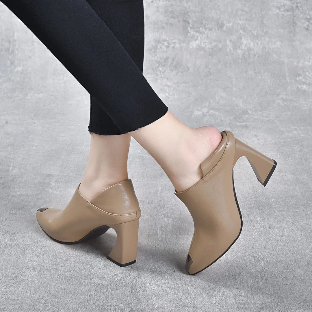 Women's pointed New European style cowhide pointed horseshoe heel .