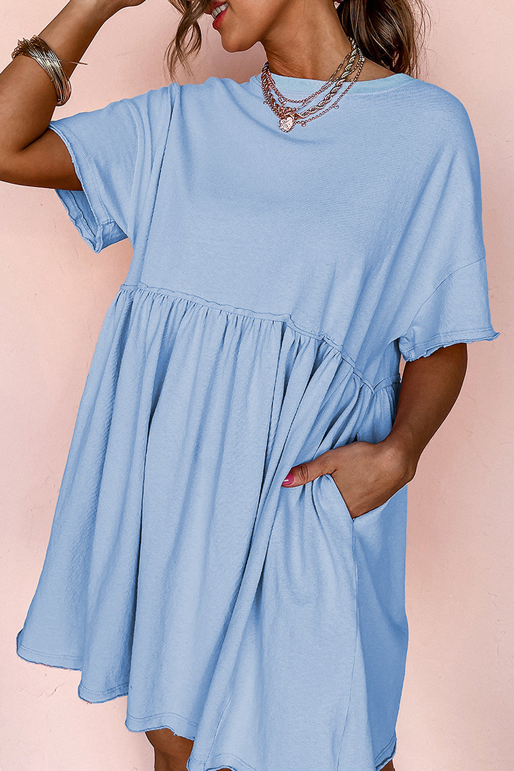 Solid Color Pocketed Raw Edge Babydoll Mini Dress
