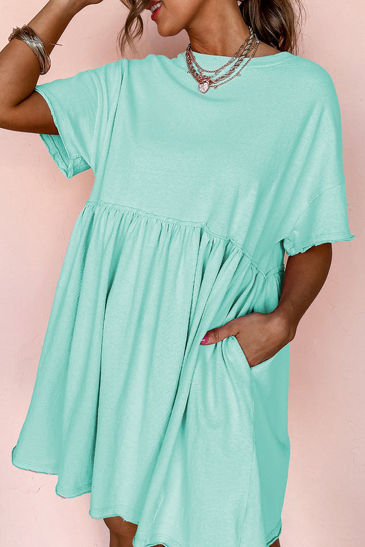 Solid Color Pocketed Raw Edge Babydoll Mini Dress