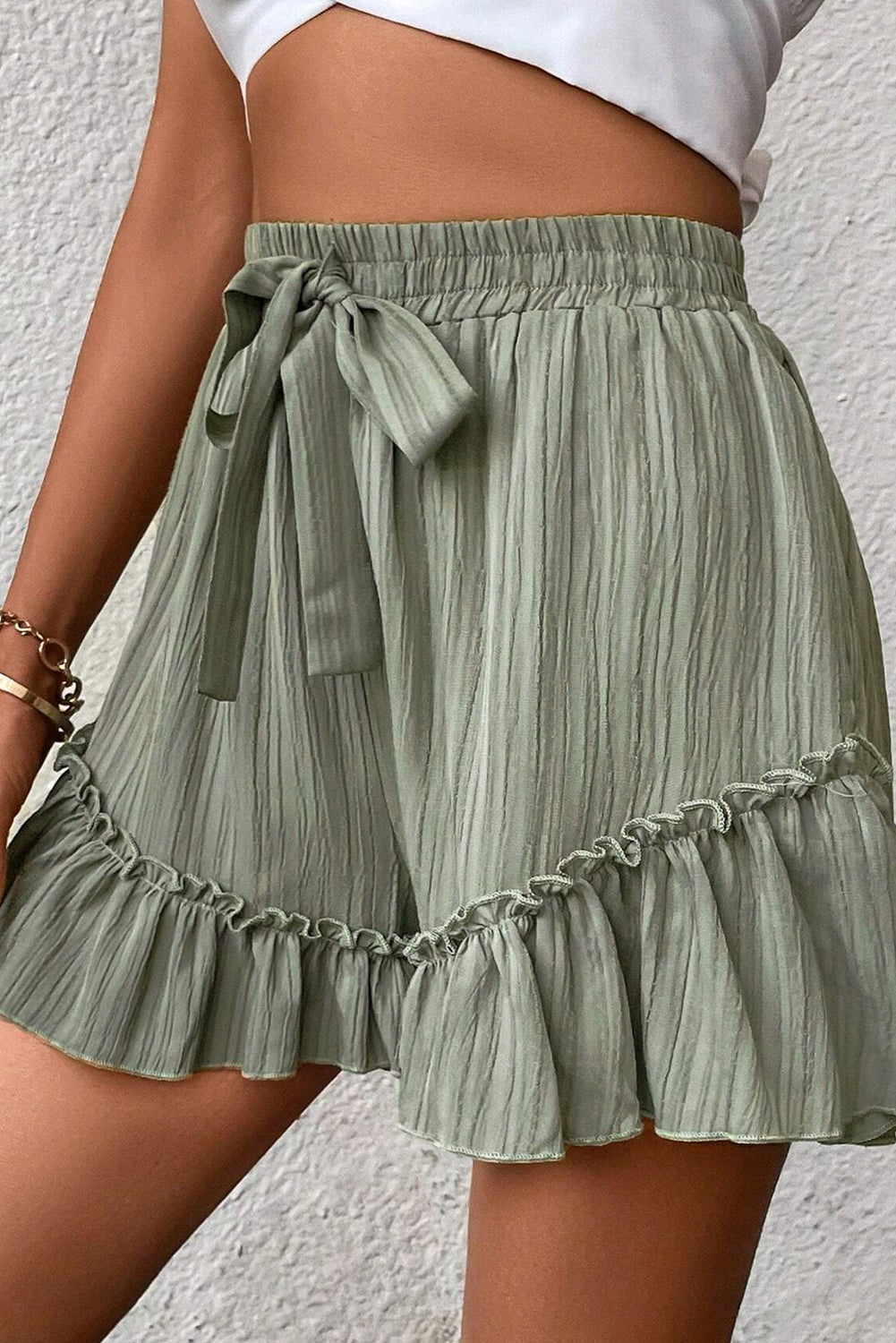 Earthy Green Textured Tie Waist Ruffle Hem Shorts