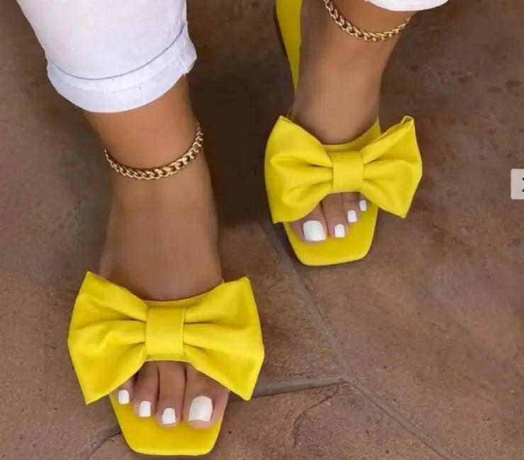 Spring/summer new flat leather bow non-slip casual all-match fashion women sandals.