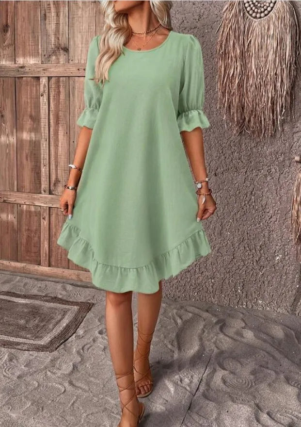 Women's Short Sleeved Round Neck Solid Colour Loose Hem Dress.  S-3X
