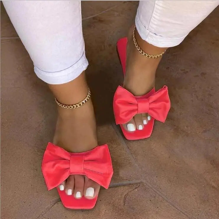 Spring/summer new flat leather bow non-slip casual all-match fashion women sandals.