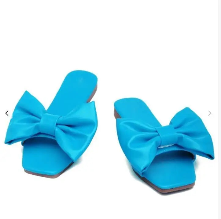 Spring/summer new flat leather bow non-slip casual all-match fashion women sandals.