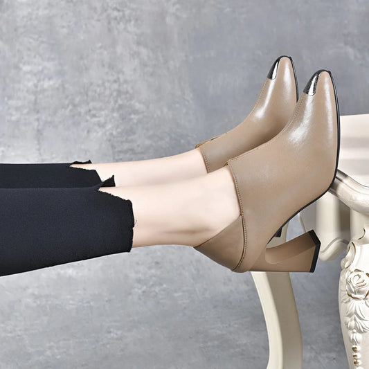 Women's pointed New European style cowhide pointed horseshoe heel .