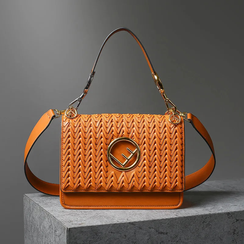 New Hollow Carved Square Bag Luxury Design Clam shell Metal Real Leather Material.