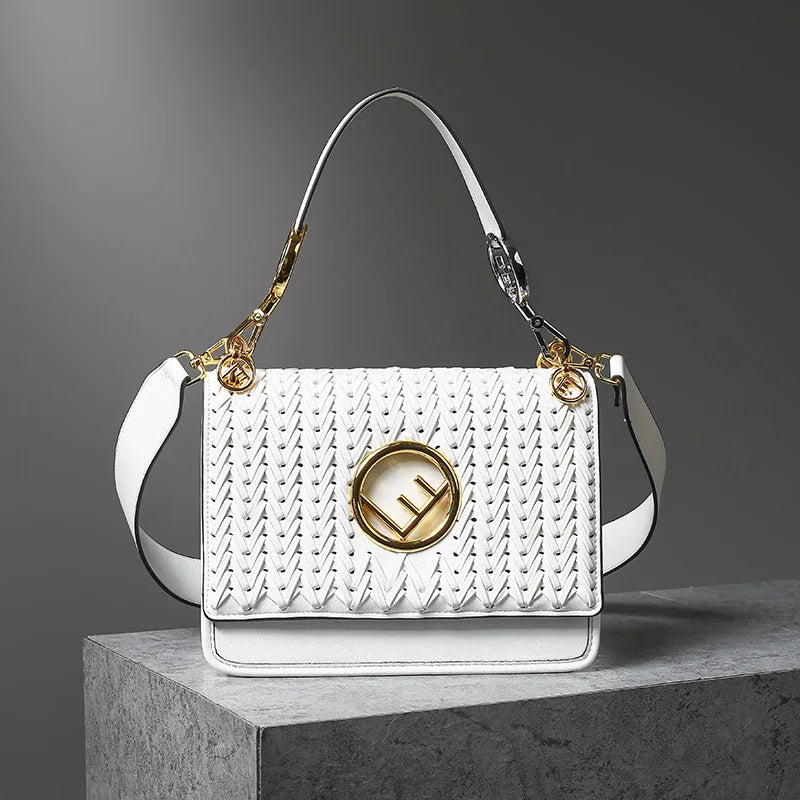 New Hollow Carved Square Bag Luxury Design Clam shell Metal Real Leather Material.