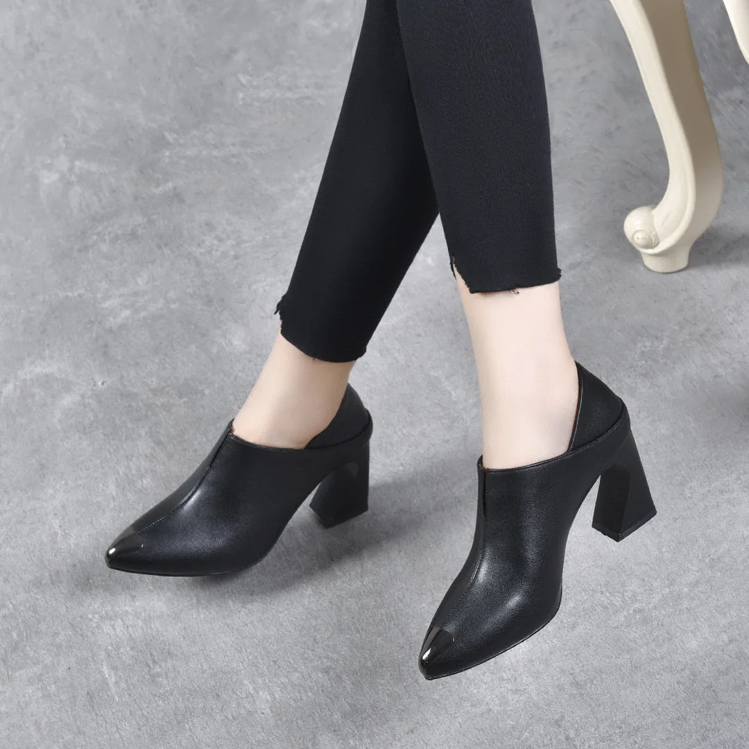 Women's pointed New European style cowhide pointed horseshoe heel .