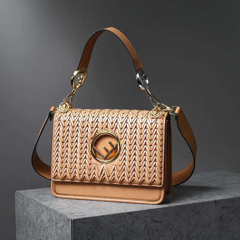 New Hollow Carved Square Bag Luxury Design Clam shell Metal Real Leather Material.