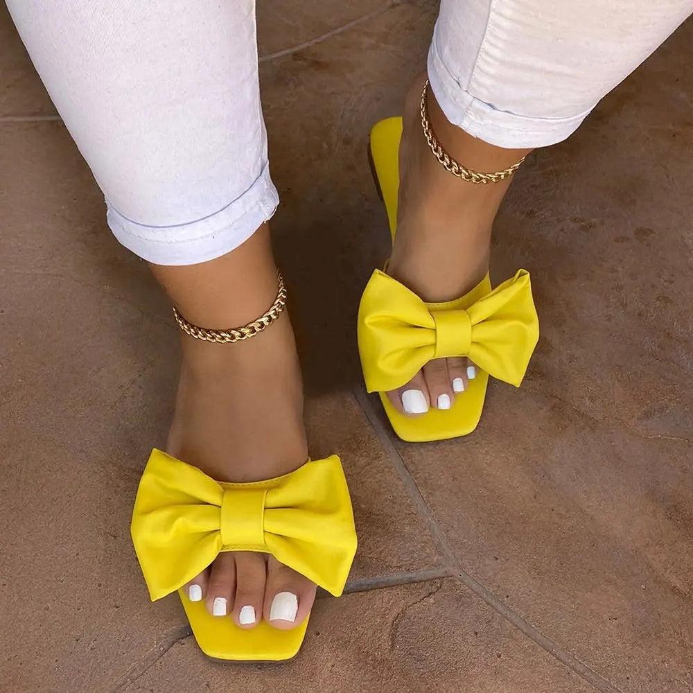 Spring/summer new flat leather bow non-slip casual all-match fashion women sandals.