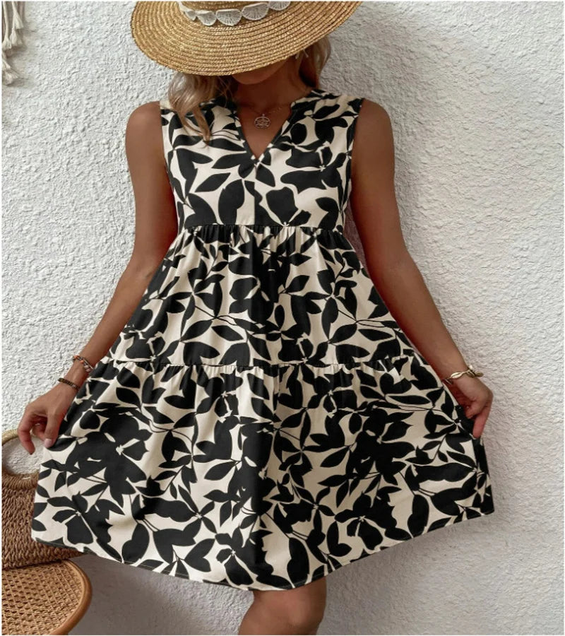 Spring and summer European Ladies Elegant Dress Bohemian fashion loose V-neck ruffle print dress.  S-2X