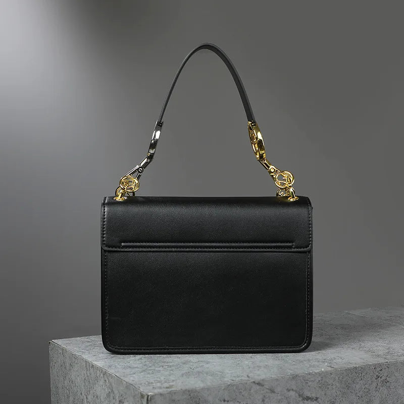 New Hollow Carved Square Bag Luxury Design Clam shell Metal Real Leather Material.