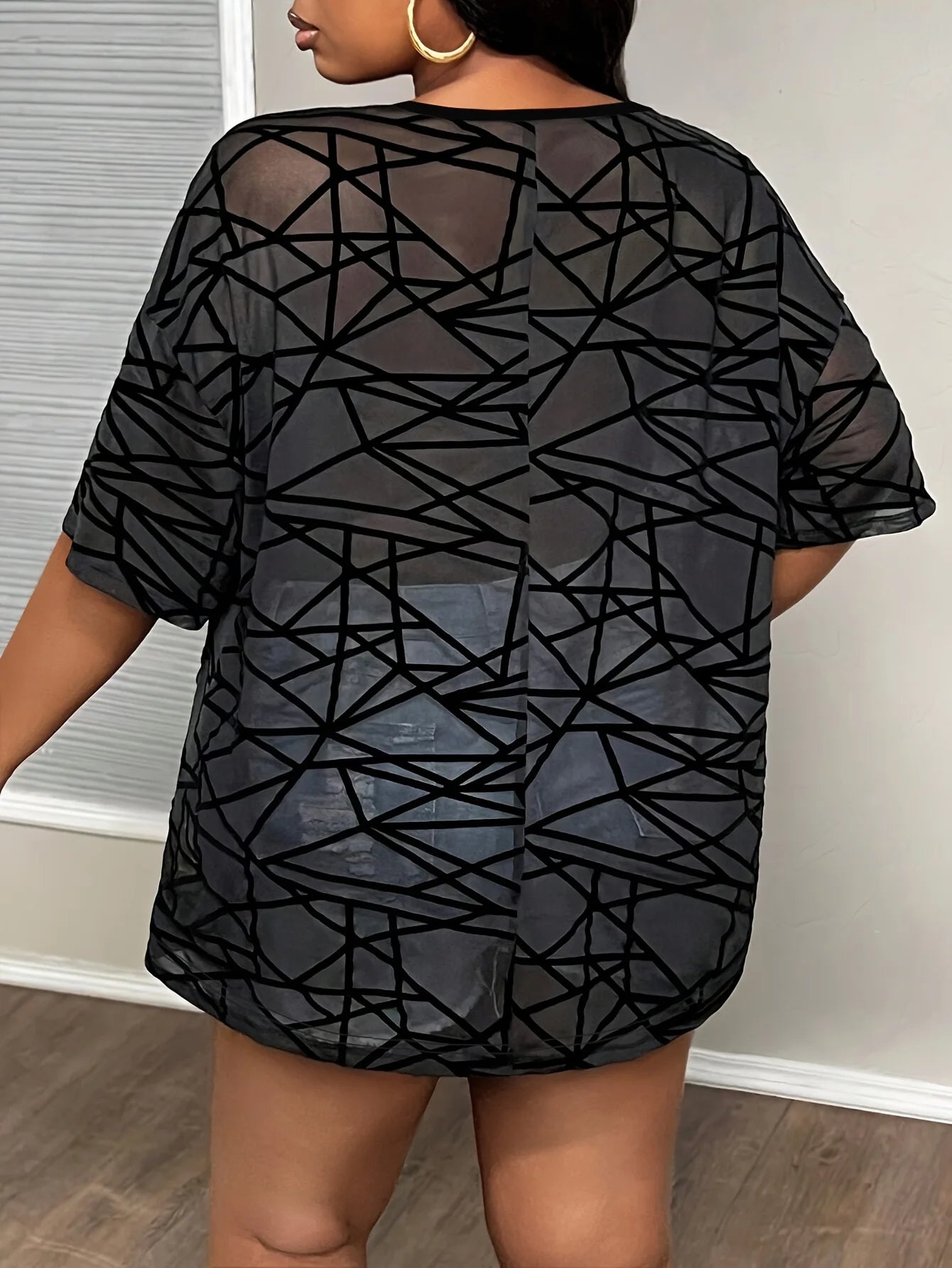 Women's large size casual black top sexy fashion loose summer top..  Very Popular!
