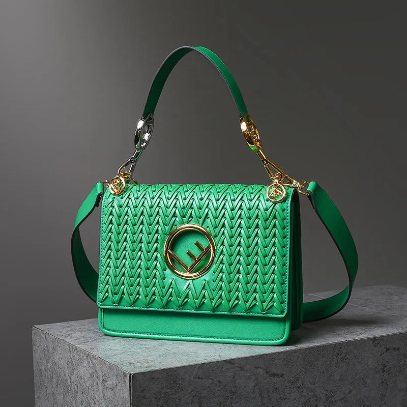 New Hollow Carved Square Bag Luxury Design Clam shell Metal Real Leather Material.