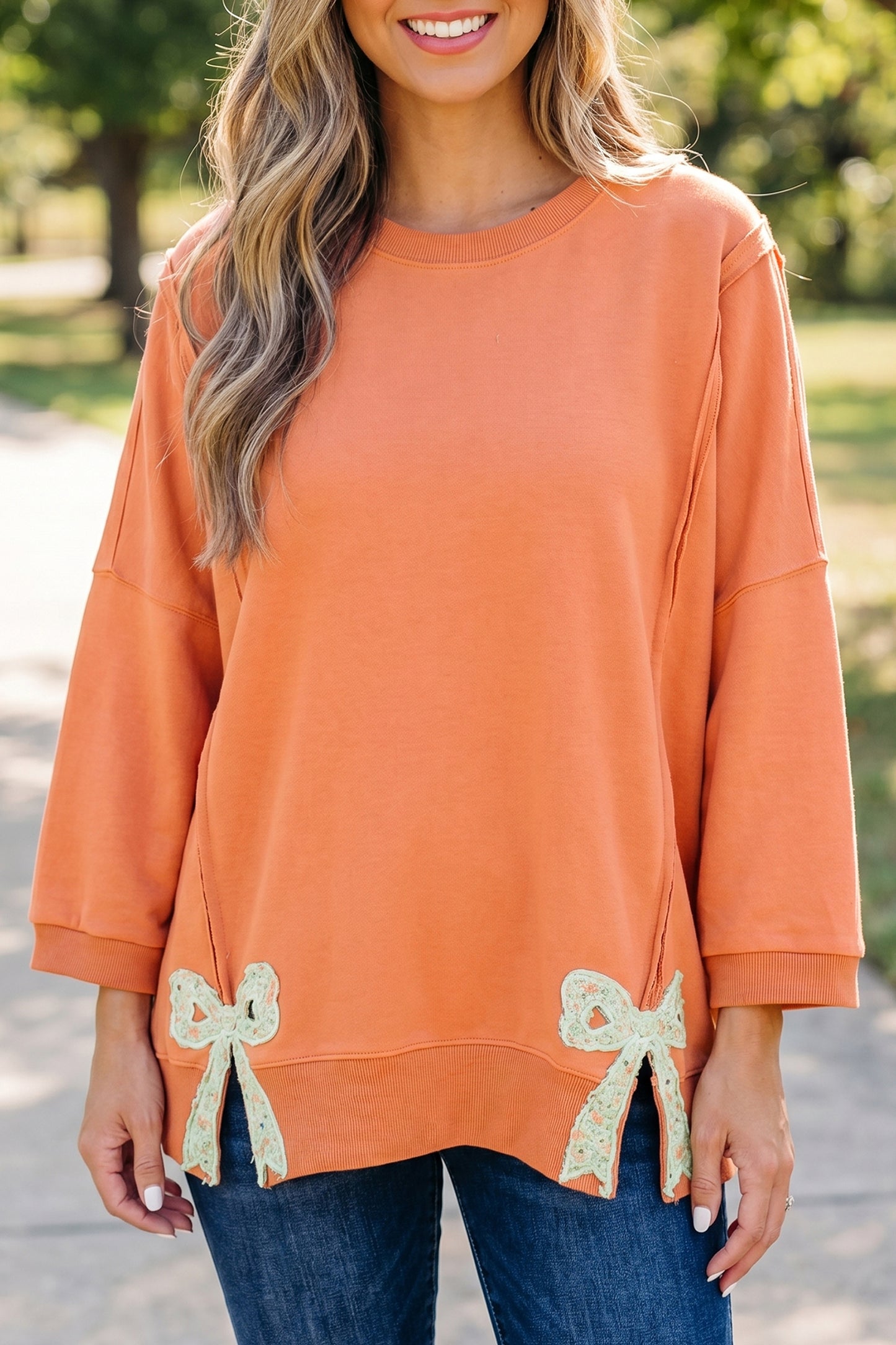 Floral Bow Patch Baggy Sweatshirt in Grapefruit Orange