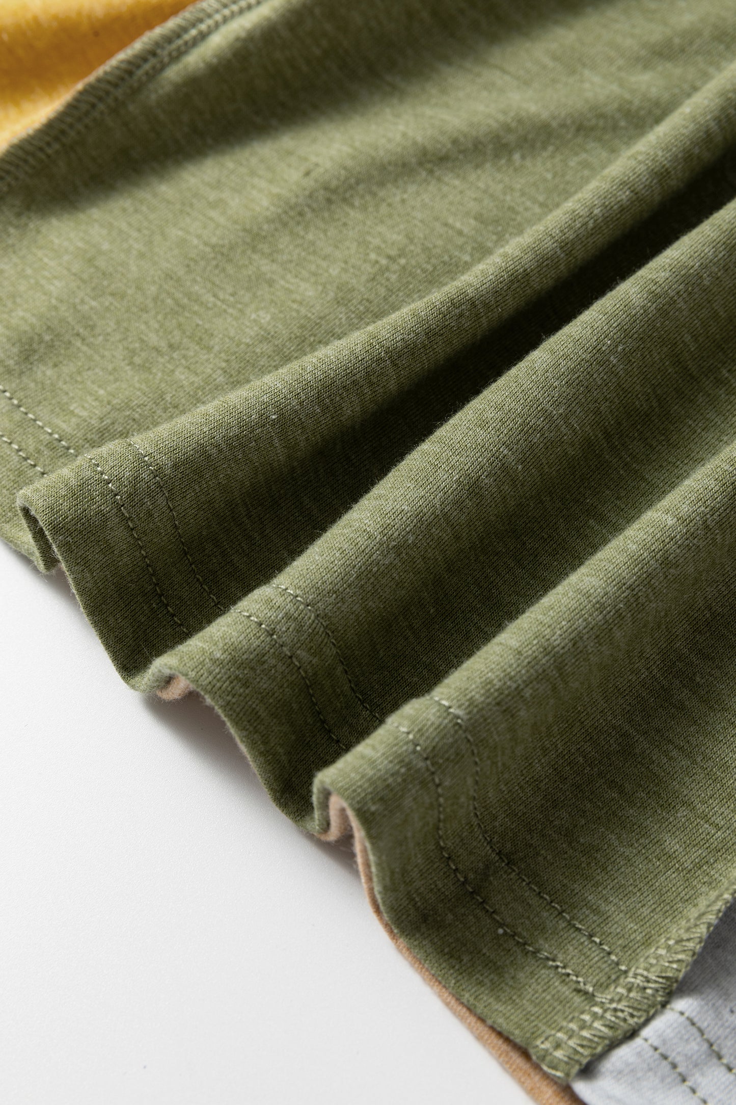 Exposed Stitching Colorblock V-Neck Top in Jungle Green