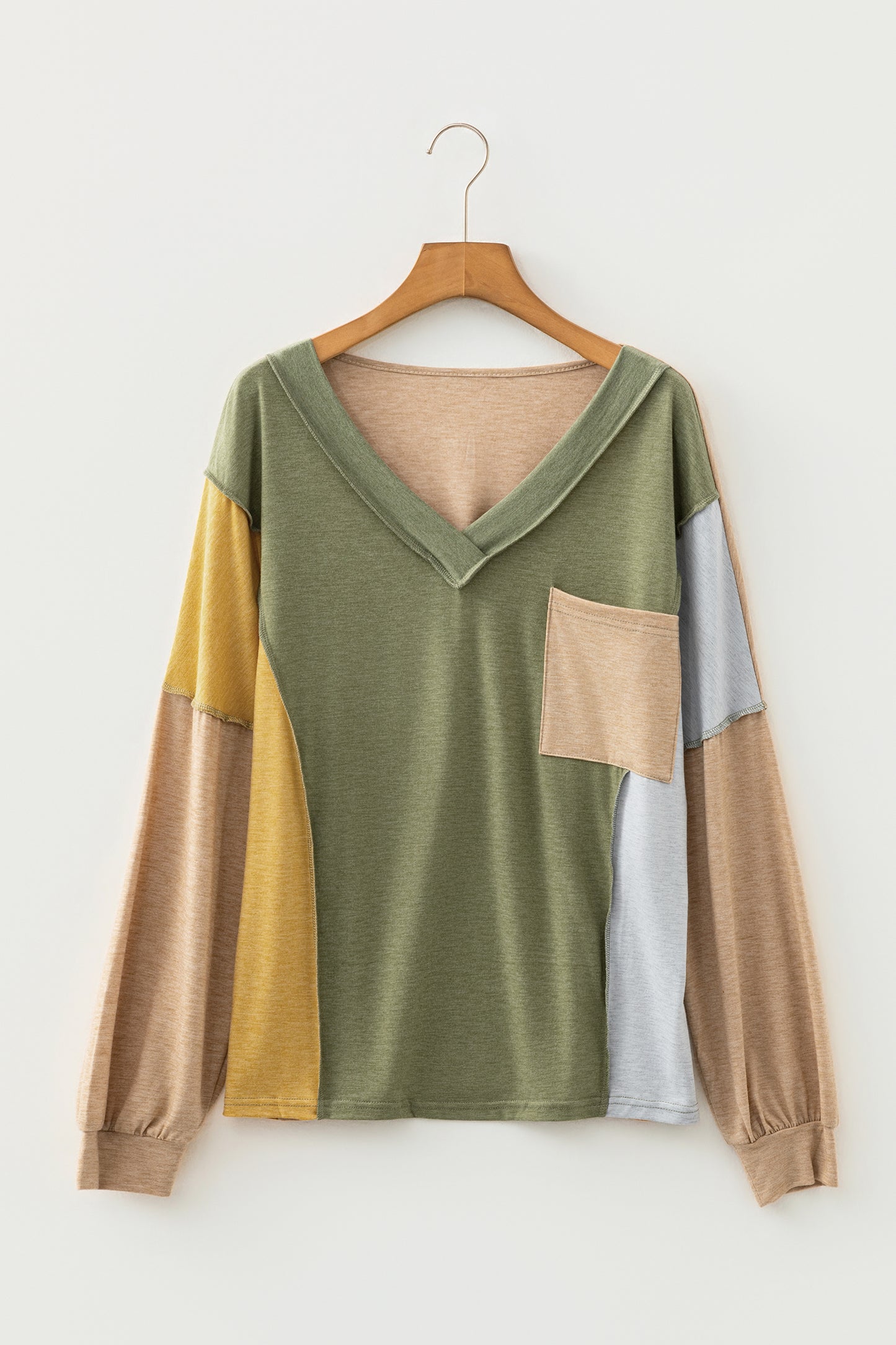 Exposed Stitching Colorblock V-Neck Top in Jungle Green